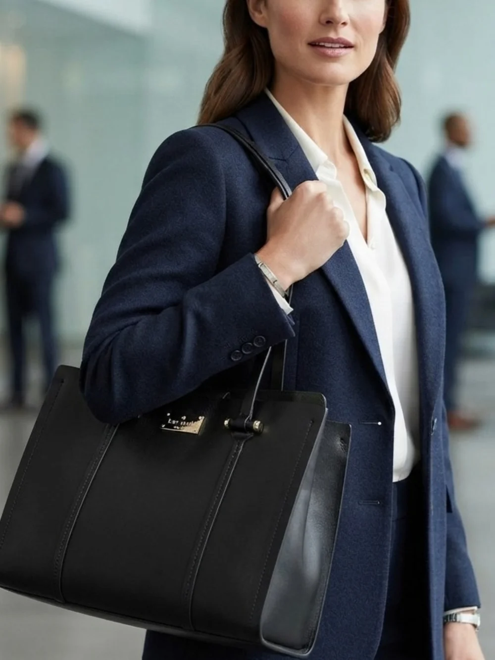 Kate Spade New York black leather tote bag with shoulder strap​